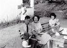 Proprietor of Little Falls Tea Room Dermot Ambrose and Betty -- Margaret holding Graham