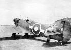 Seafire -- I fitted a new battery -- OC holding the tail down to test -- 1945