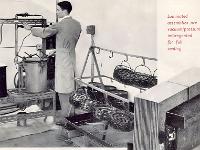 Derek operating the vacuum pump on the varnish impregnation machine