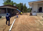 driveway going in - concrete tomorrow = most of these workers are women